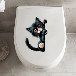 Funny 3D black peeking cat wall sticker applied on a white toilet lid in the bathroom