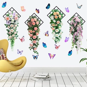 Detail of 3D flower wall stickers with rose vines and butterflies on white wall