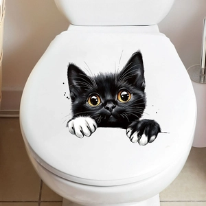 3D peek-a-boo black cat sticker with orange eyes on a white toilet lid cover