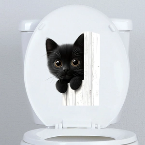 Detailed 3D black cat peeking wall sticker applied on a white toilet lid surface