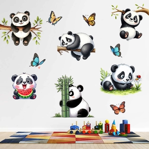 Detailed view of panda wall decals with bamboo and butterflies in a nursery setting