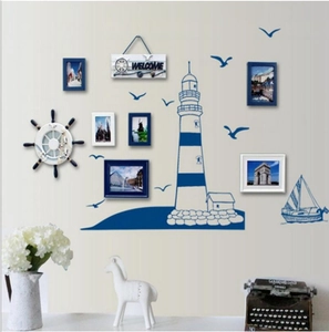 Nautical wall decor set with lighthouse, sailboat stickers and blue photo frames