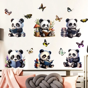 Detail of cute panda wall stickers featuring cartoon pandas reading books in a bedroom