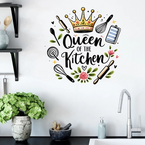 Detail view of Queen of the Kitchen wall sticker with crown and kitchen tools on white wall