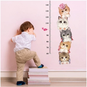 Detailed view of height scale wall sticker with cute cartoon cats and measuring scale