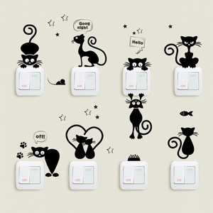 Detail view of eight black PVC cartoon cat silhouettes for light switch wall decoration