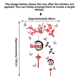 Detail of Chinese New Year wall decals featuring red plum blossoms and good luck text