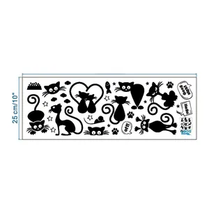 Detail of cartoon cat wall stickers layout showing black PVC silhouettes and dimensions