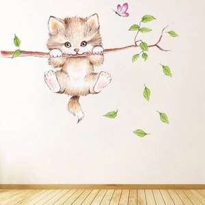 Detail showing a 3D cute brown cat hanging on a branch with a pink butterfly wall sticker