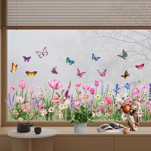 Détail de stickers électrostatiques montrant papillons colorés et motifs de jardin de tulipes