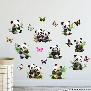 Close-up of cute 3D panda and butterfly wall stickers on a clean white surface