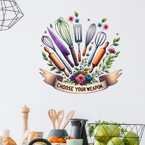 Detail of kitchen wall sticker with chef tools, floral accents and Choose Your Weapon text