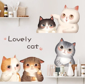 Detailed view of cute cartoon cat wall stickers with Lovely Cat text in a kitchen setting