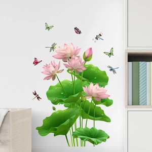 Detail of waterproof lotus and dragonfly wall stickers on a clean white living room wall