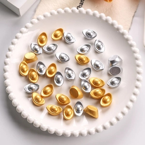 Gold and silver resin sycee ornaments in a decorative tray for DIY miniature decor