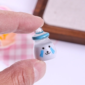 Miniature resin milk bottle toy with cute cartoon face for dollhouse decoration