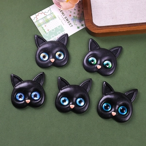 DIY resin black cat charms with vibrant glass eyes for phone cases and craft accessories