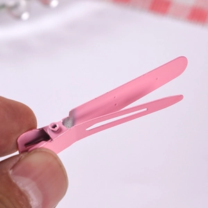 Pink metal duckbill hair clip with matte spray paint finish for DIY hair accessories