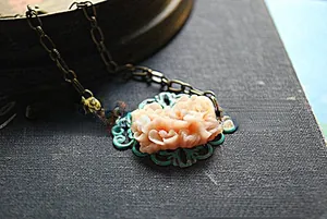 Retro forest style pink resin rose pendant with vintage bronze chain necklace detail
