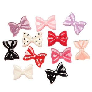 Colorful resin polka dot and glitter bow charms for DIY phone cases and hair clips