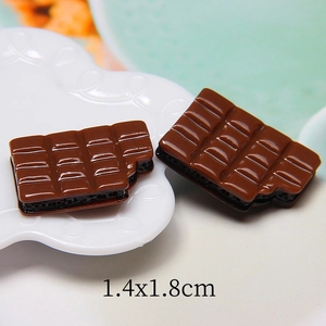 Macro shot of 1.4x1.8cm miniature resin chocolate cabochon for DIY crafts decoration