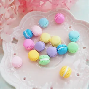 Macro view of colorful clay macaron charms for DIY phone cases and hair accessories