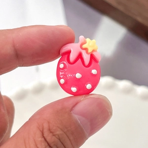 DIY resin strawberry charms for hair clips and cream glue crafts with white polka dots