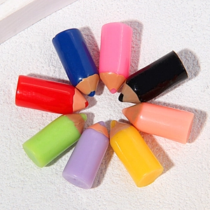 Set of eight colorful mini resin pencils arranged in a circle for DIY crafts