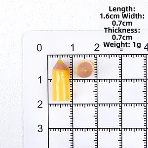 Detailed view of yellow mini resin pencil charm measuring 1.6cm for DIY crafts