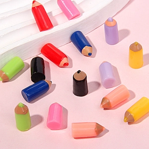 Miniature colorful resin pencils in multiple vibrant shades for DIY crafts and accessories