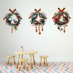 Three-piece Christmas wall stickers featuring birds, pine cones and berries on white walls