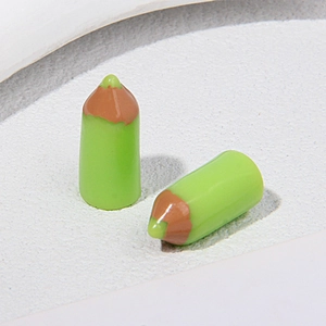Macro shot of bright green miniature resin colored pencils for DIY jewelry accessories