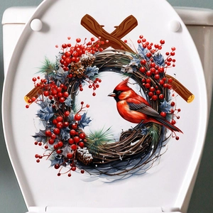 Detail view of a Christmas wreath toilet sticker with red cardinal and winter berries