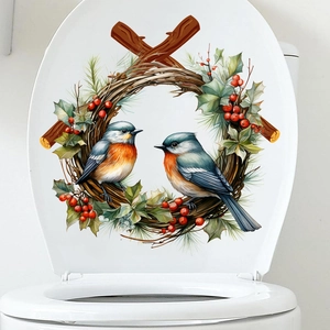 Winter wreath wall sticker with robins and red berries on a white toilet lid background