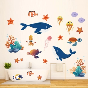 Detail of colorful cartoon sea life wall stickers applied on a bathroom tile wall and bathtub