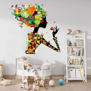 Artistic wall sticker featuring a woman's silhouette with colorful fruit and flower patterns