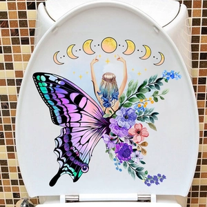 Macro detail of a fairy girl with butterfly wings sticker applied on a white toilet lid