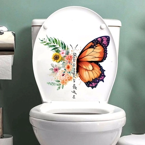 Floral butterfly toilet seat sticker with there is magic in all of us slogan on white cover