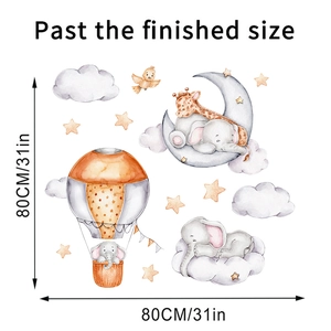 Detail of baby elephant and giraffe wall decals with finished 80x80cm dimensions