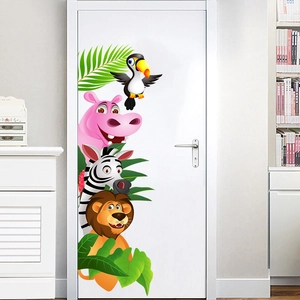 Detail of cartoon safari animal wall decals featuring hippo and zebra on a white door
