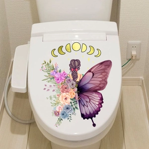 Self-adhesive toilet lid sticker featuring butterfly wings and floral moon phase design