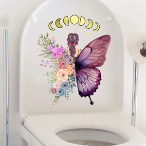 Detail of floral butterfly girl wall sticker with watercolor moon on a white toilet lid