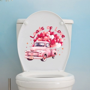 Detail view of Valentine's truck wall decal with Loads of Love text on a white toilet lid