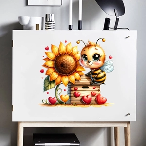 Detail of self-adhesive sunflower and bee wall decals on a minimalist white cabinet surface