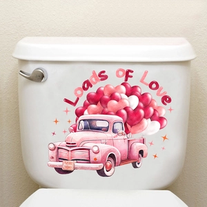 Close-up of Loads of Love pink vintage truck wall sticker applied to white ceramic tank