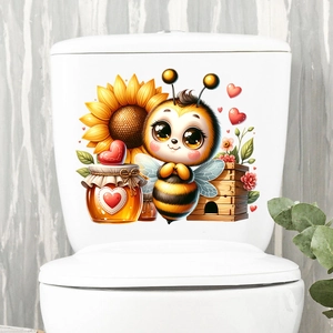 Detail of cute bee, sunflower and heart stickers on white ceramic toilet tank surface