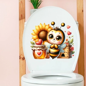Close-up of a cute bee and sunflower self-adhesive sticker on a white toilet lid cover
