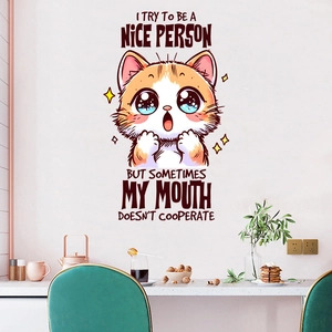 Funny orange cat wall sticker with humorous quote on a modern kitchen wall decor