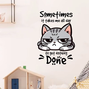 Detail of funny cat wall sticker with text on a neutral children room wall