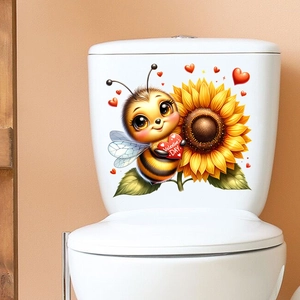 Close-up of Valentine's Day bee and sunflower self-adhesive decals on a white toilet tank